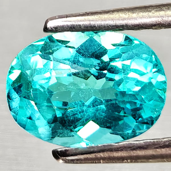 Natural Paraiba Color Apatite 0.84 Ct. Oval Shape 6.8 x 5.1 Mm Gemstones From Tanzania: Product ID: 800613691 Product Name: Natural Apatite Weight: 0.84 CT. Size: 6.8 x 5.1 x 3.7 MM. Shape: Oval Color: Neon Blue Clarity:VSI Luster: Good Gems Origin: Tanzania Treatment: Unheated Crystal S