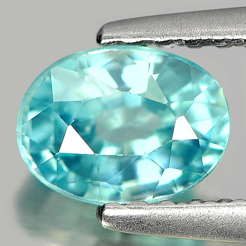 Natural Blue Zircon 1.24 Ct. Oval Shape 6.4 x 4.8 Mm Gemstone from Cambodia: Product ID: 807724940 Product Name: Natural Zircon Weight: 1.24 CT. Size: 6.4 x 4.8 x 3.8 MM. Shape: Oval Color: Blue Clarity:SI Luster: Good Gems Origin: Cambodia Treatment: Heated Crystal Structure: