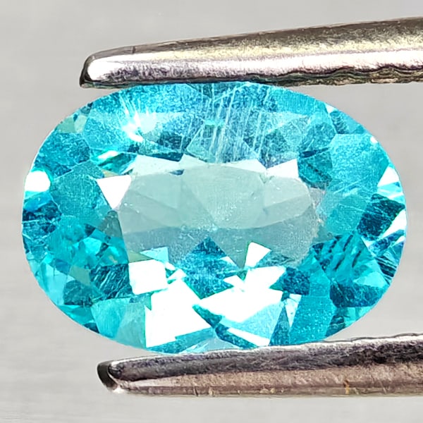 Natural Paraiba Color Apatite 0.73 Ct. Oval Shape 7.2 x 5.2 Mm Gemstones From Tanzania: Product ID: 800613697 Product Name: Natural Apatite Weight: 0.73 CT. Size: 7.2 x 5.2 x 3 MM. Shape: Oval Color: Neon Blue Clarity:VSI Luster: Good Gems Origin: Tanzania Treatment: Unheated Crystal Str