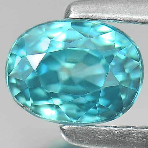 Natural Blue Zircon 1.18 Ct. Oval Shape 6 x 4.6 Mm. Gemstone From Cambodia: Product ID: 807727642 Product Name: Natural Zircon Weight: 1.18 CT. Size: 6 x 4.6 x 4.2 MM. Shape: Oval Color: Blue Clarity:VSI Luster: Good Gems Origin: Cambodia Treatment: Heated Crystal Structure: