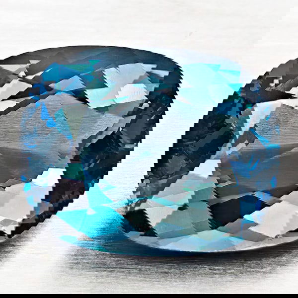 Natural London Blue Topaz 4.80 Ct. Cushion Shape 11 x 9 Mm Gemstone From Brazil: Product ID: 807168321 Product Name: Natural Blue Topaz Weight: 4.80 CT. Size: 11 x 9 x 5.9 MM. Shape: Cushion Shape Color: London Blue Clarity:VVS - VSI Luster: Good Gems Origin: Brazil Treatment: Tre