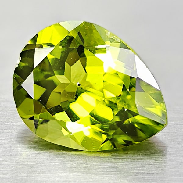 Natural Green Peridot 1.93 Ct. Pear Shape 9.1 x 7 Mm. Gemstone From Pakistan: Product ID: 805317012 Product Name: Natural Weight: 1.93 CT. Size: 9.1 x 7 x 4.9 MM. Shape: Pear Color: Green Clarity:VSI Luster: Good Gems Origin: Pakistan Treatment: Unheated Crystal Structure: Hard