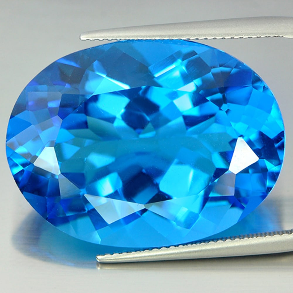 Natural Swiss Blue Topaz 48.95 Ct. VVS Oval Shape 28 x 20 Mm. Gemstone From Brazil (1 of 3)