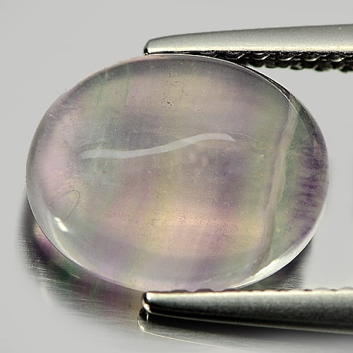 Natural Multi-Color Fluorite 3.42 Ct. Oval Cabochon Shape 10 x 7.9 Mm Gemstone From Brazil: Product ID: 802706088 Product Name: Natural Fluorite Weight: 3.42 CT. Size: 10 x 7.9 x 4.3 MM. Shape: Oval Cabochon Color: Multi-Color Clarity:Semi - Transparent Luster: Good Gems Origin: Brazil Treat