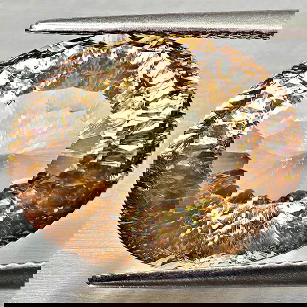 Natural Imperial Topaz 13.79 Ct. Oval Concave Cut 12.7 x 15.6 Mm Gemstone From Brazil: Product ID: 807168261 Product Name: Natural Topaz Weight: 13.79 CT. Size: 12.7 x 15.6 x 9.5 MM. Shape: Oval Concave Cut Color: Imperial Clarity:VSI Luster: Very Good Gems Origin: Brazil Treatment: Unh