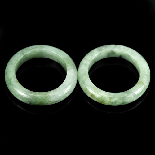 Natural Green Rings Jade 21.79 Ct. 2 Pcs. Unheated Gemstones Size 5: Product ID: 819809445 Product Name: Natural Jade Weight: 21.79 CT. Size: 21 x 21 MM. Shape: Round Color: White Green Clarity:Opaque Luster: Good Gems Origin: Thailand Treatment: Unheated Crystal Struc