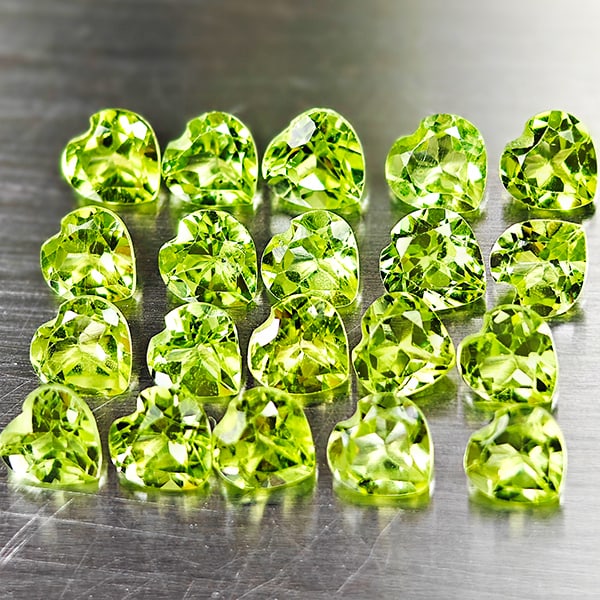 Natural Green Peridot 5.15 Ct. 20 Pcs. VVS Heart Shape 4.1 x 4 Mm. Gemstone From Pakistan: Product ID: 805317003 Product Name: Natural Peridot Weight: 5.15 CT. Size: 4.1 x 4 x 2.3 MM. Shape: Heart Color: Green Clarity:VVS Luster: Good Gems Origin: Pakistan Treatment: Unheated Crystal Struct