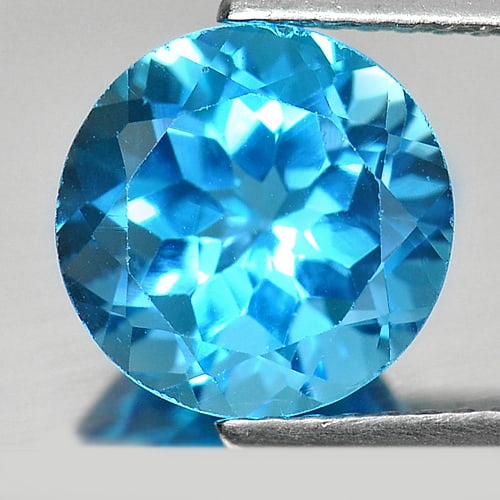Natural Swiss Blue Topaz 3.36 Ct. Round Shape 9 Mm Gemstone from Brazil: Product ID: 807157052 Product Name: Natural Blue Topaz Weight: 3.36 CT. Size: 9 x 9 x 6 MM. Shape: Round Color: Swiss Blue Clarity:SI1 Luster: Good Gems Origin: Brazil Treatment: Treated Crystal Struc