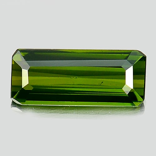 Natural Green Tourmaline 1.01 Ct. Octagon Shape 9.5 x 4 Mm. Gemstone From Nigeria: Product ID: 807245282 Product Name: Natural Tourmaline Weight: 1.01 CT. Size: 9.5 x 4 x 2.7 MM. Shape: Octagon Color: Green Clarity:VSI Luster: Good Gems Origin: Nigeria Treatment: Unheated Crystal St