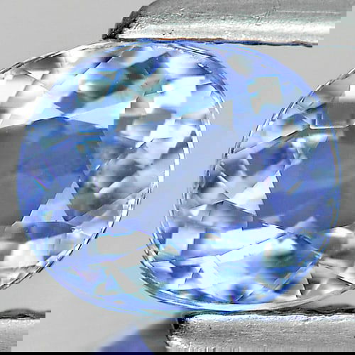 Natural Violet Blue Tanzanite 0.91 Ct. Oval Shape 6.3 x 5.4 Mm Gemstone From Tanzania: Product ID: 807004534 Product Name: Natural Tanzanite Weight: 0.91 CT. Size: 6.3 x 5.4 x 3.5 MM. Shape: Oval Color: Violet Blue Clarity:VSI Luster: Good Gems Origin: Tanzania Treatment: Heated Crystal