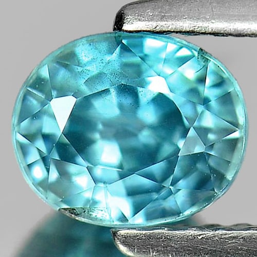 Natural Blue Zircon 1.53 Ct. Oval Shape 6.6 x 5.4 Mm Gemstone from Cambodia: Product ID: 807726965 Product Name: Natural Zircon Weight: 1.53 CT. Size: 6.6 x 5.4 x 4.2 MM. Shape: Oval Color: Blue Clarity:SI Luster: Good Gems Origin: Cambodia Treatment: Heated Crystal Structure: