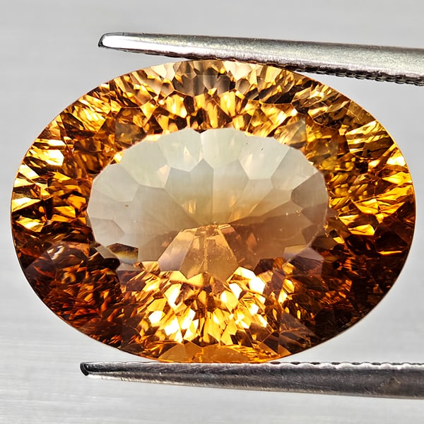 Natural Imperial Topaz 15.20 Ct. Oval Concave Cut 17.4 x 13.1 Mm. Gemstone From Brazil: Product ID: 807168290 Product Name: Natural Topaz Weight: 15.20 CT. Size: 17.4 x 13.1 x 9.1 MM. Shape: Oval Concave Color: Imperial Clarity:VSI Luster: Good Gems Origin: Brazil Treatment: Unheated Cry