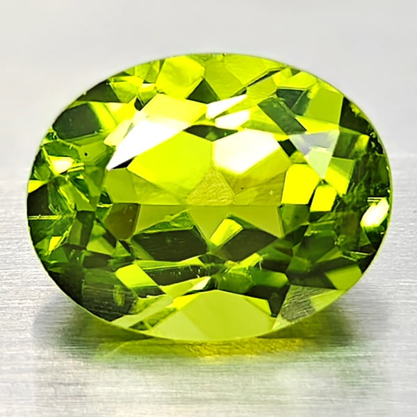Natural Green Peridot 2.74 Ct. Oval Shape 7.2 x 9.2 Mm. Gemstone From Pakistan: Product ID: 805316948 Product Name: Natural Peridot Weight: 2.74 CT. Size: 7.2 x 9.2 x 5.6 MM. Shape: Oval Color: Green Clarity:VSI Luster: Good Gems Origin: Pakistan Treatment: Unheated Crystal Struc
