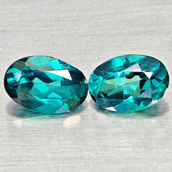 Natural Bluish Green Topaz 1.23 Ct. 2 Pcs Oval Shape 6.2 x 4.2 Mm Gemstones From Brazil: Product ID: 807168066 Product Name: Natural Topaz Weight: 1.23 CT. Size: 6.2 x 4.2 x 3.1 MM. Shape: Oval Color: Bluish Green Clarity:VSI Luster: Good Gems Origin: Brazil Treatment: Treated Crystal Str