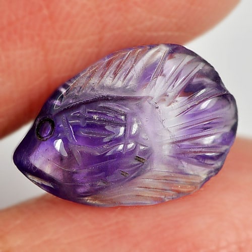Natural Purple Amethyst 3.45 Ct. Fish Carving Shape 14.4 x 9.5 Mm. Gemstone From Brazil: Product ID: 810303660 Product Name: Natural Amethyst Weight: 3.45 CT. Size: 14.4 x 9.5 x 4.9 MM. Shape: Fish Carving Color: Purple Clarity:Semi - Transparent Luster: Good Gems Origin: Brazil Treatment
