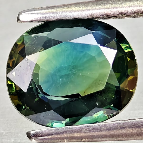 Natural Multi Color Sapphire 1.22 Ct. Oval Shape 7.2 x 6.1 Mm Gemstone from Thailand: Product ID: 806162417 Product Name: Natural Green Sapphire Weight: 1.22 CT. Size: 7.2 x 6.1 x 3 MM. Shape: Oval Shape Color: Yellowish Green Clarity:VSI Luster: Good Gems Origin: Thailand Treatment: H