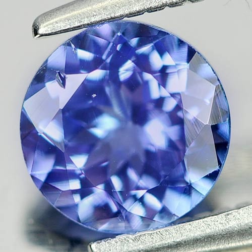 Natural Violetish Blue Tanzanite 0.88 Ct. Round Shape 6 Mm Gemstone From Tanzania: Product ID: 807009570 Product Name: Natural Tanzanite Weight: 0.88 CT. Size: 6 x 6 x 3.6 MM. Shape: Round Color: Violetish Blue Clarity:SI Luster: Good Gems Origin: Tanzania Treatment: Heated Crystal