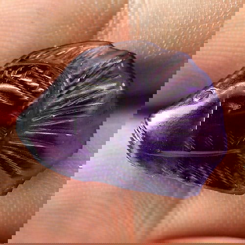 Natural Violet Amethyst 7.06 Ct. Fish Carving Size 17.2 x 12 Mm Gemstone From Brazil: Product ID: 810302765 Product Name: Natural Amethyst Weight: 7.06 CT. Size: 17.2 x 12 x 6.3 MM. Shape: Fish Carving Color: Violet Clarity:Semi - Transparent Luster: Good Gems Origin: Brazil Treatment: