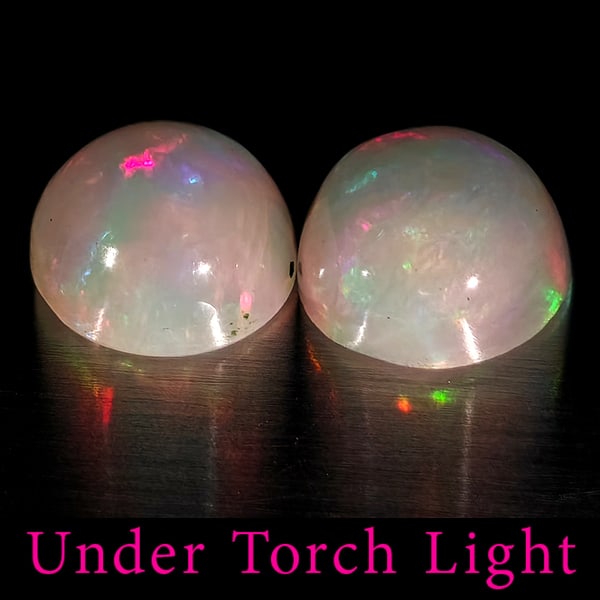 Natural Multi Color Opal 1.67 Ct. 2 Pcs Round Cabochon Shape 7 Mm Gemstones From Ethiopia: Product ID: 818728241 Product Name: Natural Opal Weight: 1.67 CT. Size: 7 x 7 x 4 MM. Shape: Round Color: Multi-Color Clarity:Semi - Transparent Luster: Good Gems Origin: Ethiopia Treatment: Unheated 