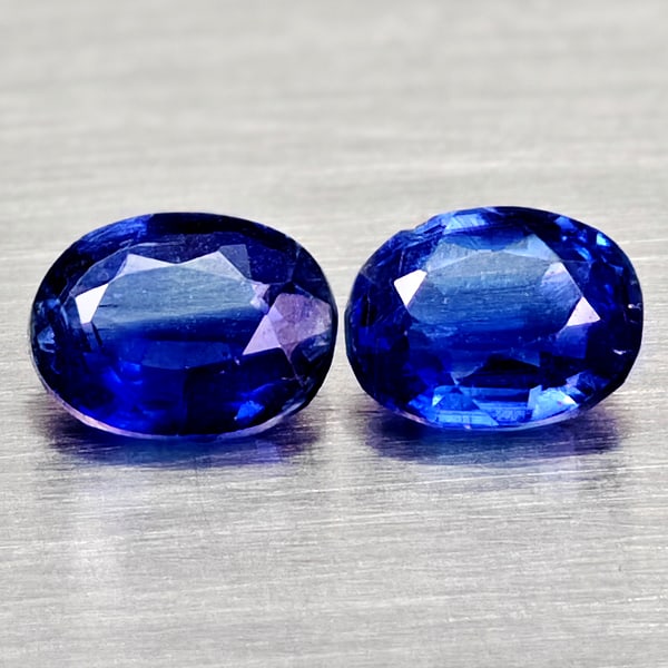 Natural Blue Kyanite 0.91Ct. 2 Pcs Oval Shape Gemstones From Sri - Lanka: Product ID: 804204824 Product Name: Natural Kyanite Weight: 0.91 CT. Size: 5.2 x 4 x 2.5 to 5 x 3.9 x 2.6 MM. Shape: Oval Color: Blue Clarity:VSI - SI1 Luster: Good Gems Origin: Sri - Lanka Treatment: