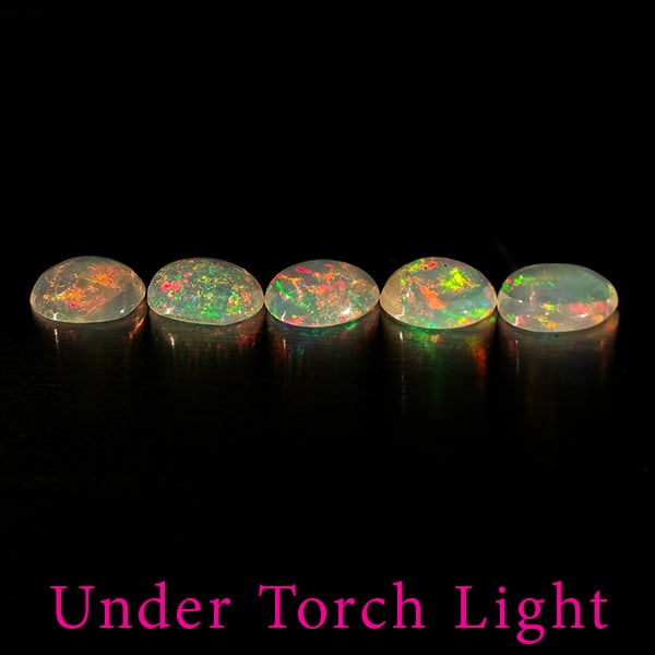 Natural Multi Color Opal 1.20 Ct. 5 Pcs Oval Cabochon Shape 5.8 x 4 Mm. Gemstones: Product ID: 818728059 Product Name: Natural Opal Weight: 1.20 CT. Size: 5.8 x 4 x 2.6 MM. Shape: Oval Cabochon Color: Multi-Color Clarity:Semi - Transparent Luster: Good Gems Origin: Ethiopia Treatmen