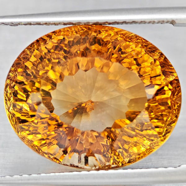 Natural Imperial Topaz 19.95 Ct. Oval Concave Cut 17 x 14 Mm Gemstone From Brazil: Product ID: 807168631 Product Name: Natural Topaz Weight: 19.95 CT. Size: 17 x 14 x 11.4 MM. Shape: Oval Shape Color: Imperial Clarity:VSI Luster: Good Gems Origin: Brazil Treatment: Treated Crystal S