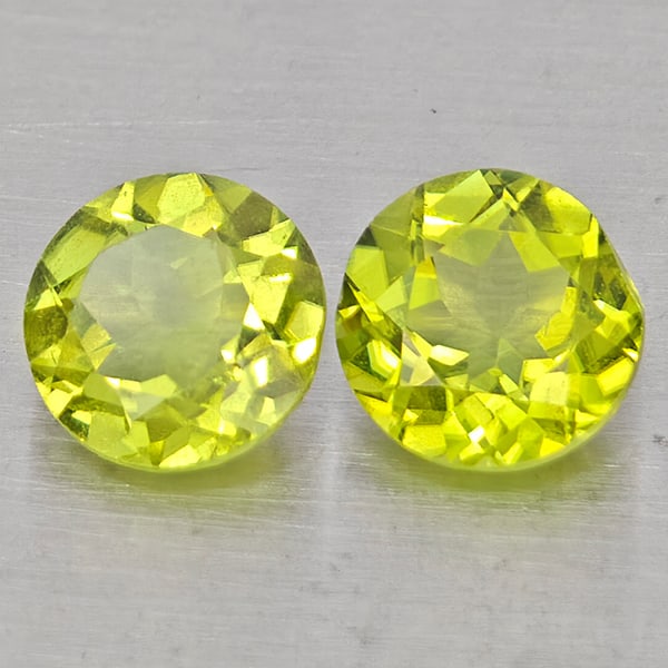 Natural Green Peridot 1.55 Ct. 2 Pcs Round Shape 5.9 Mm Gemstones from Pakistan: Product ID: 805317498 Product Name: Natural Rhodolite Weight: 1.55 CT. Size: 5.9 x 5.9 x 3.5 MM. Shape: Round Color: Green Clarity:VSI Luster: Good Gems Origin: Pakistan Treatment: Unheated Crystal St