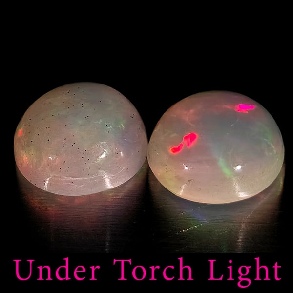 Natural Multi Color Opal 1.53 Ct. 2 Pcs Round Cabochon Shape 7 Mm Gemstones From Ethiopia: Product ID: 818728237 Product Name: Natural Opal Weight: 1.53 CT. Size: 7 x 7 x 3.5 MM. Shape: Round Color: Multi-Color Clarity:Semi - Transparent Luster: Good Gems Origin: Ethiopia Treatment: Unheate