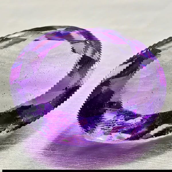 Natural Purple Amethyst 4.30 Ct. Oval Shape 11.8 x 9.5 Mm Gemstone From Brazil: Product ID: 800325400 Product Name: Natural Amethyst Weight: 4.30 CT. Size: 11.8 x 9.5 x 5.7 MM. Shape: Oval Color: Purple Clarity:VSI Luster: Good Gems Origin: Brazil Treatment: Unheated Crystal Stru