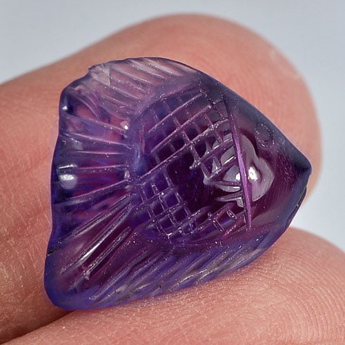 Natural Violet Amethyst 8.07 Ct. Fish Carving Shape 15.5 x 13.9 Mm Gemstone From Brazil: Product ID: 810303035 Product Name: Natural Amethyst Weight: 8.07 CT. Size: 15.5 x 13.9 x 6.9 MM. Shape: Fish Carving Color: Violet Clarity:Semi - Transparent Luster: Good Gems Origin: Brazil Treatmen
