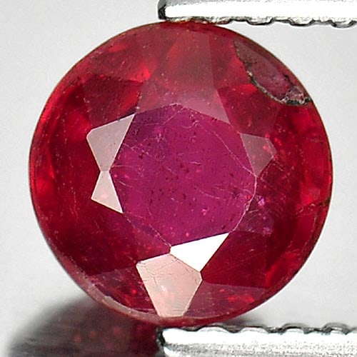 Natural Pinkish Red Ruby 1.24 Ct. Round Shape 6.4 Mm Gemstone from Madagascar: Product ID: 805933670 Product Name: Natural Ruby Weight: 1.24 CT. Size: 6.4 x 6.4 x 3.4 MM. Shape: Round Color: Pinkish Red Clarity:SI1 Luster: Good Gems Origin: Madagascar Treatment: Heated (Lead-gla