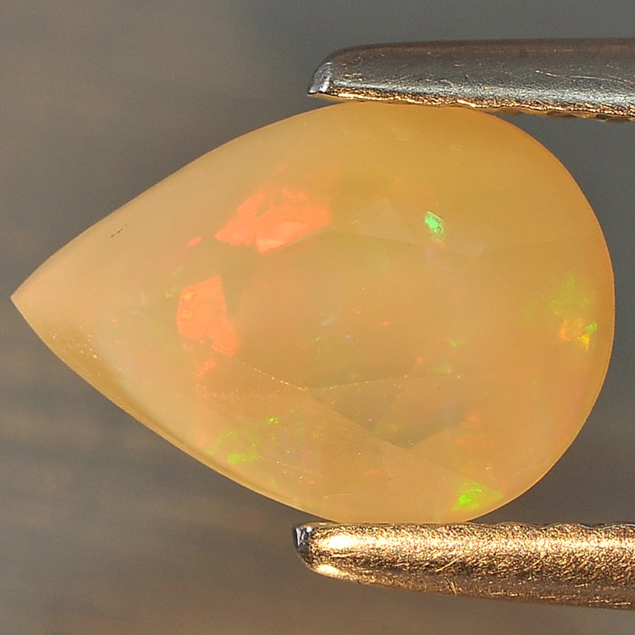 Natural Multi Color Opal 1.24 Ct. Pear Shape 9.4 x 6.7 Mm Gemstone from Ethiopia (1 of 3)