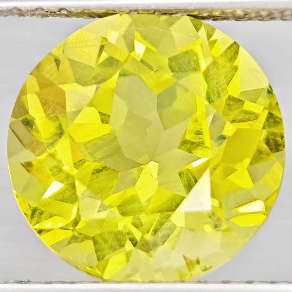 Natural Yellow Lemon Quartz 3.90 Ct. Round Shape 10.1 Mm Gemstone From Brazil: Product ID: 805530102 Product Name: Natural Quartz Weight: 3.90 CT. Size: 10.1 x 10.1 x 7.5 MM. Shape: Round Color: Yellow Lemon Clarity:VSI Luster: Good Gems Origin: Brazil Treatment: Unheated Crysta