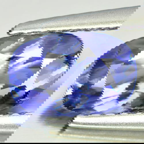 Certified Natural Violetish Blue Tanzanite 0.92Ct. Clean Oval Shape 7.67 x 5.01 Mm Gemstone from: Product ID: 807005506 Product Name: Natural Tanzanite Weight: 0.92 CT. Size: 7.67 x 5.01 x 3.32 MM. Shape: Oval Color: Blue Clarity:IF Luster: Very Good Gems Origin: Tanzania Treatment: Heated Crystal