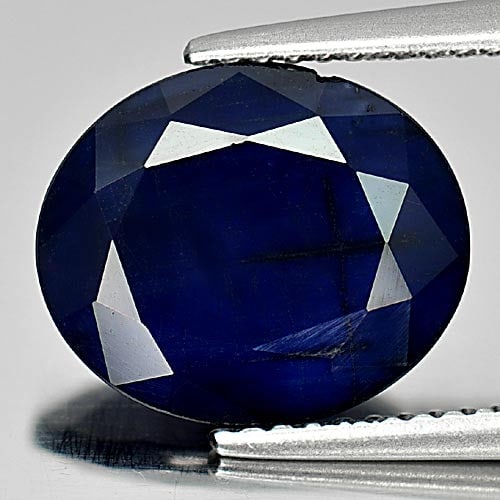 Natural Deep Blue Sapphire 4.06 Ct. Oval Shape 11.9 x 10.1 Mm Gemstone from Madagascar: Product ID: 806011227 Product Name: Natural Blue Sapphire Weight: 4.06 CT. Size: 11.9 x 10.1 x 3.7 MM. Shape: Oval Color: Deep Blue Clarity:Opaque Luster: Good Gems Origin: Madagascar Treatment: Heate