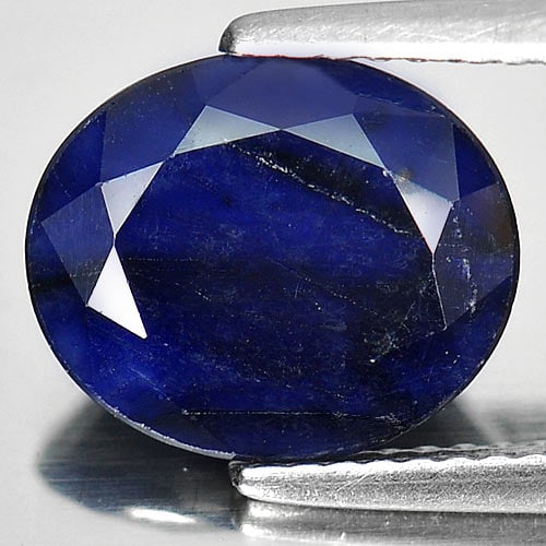 Natural Deep Blue Sapphire 4.14 Ct. Oval Shape 11 x 9.2 Mm Gemstone from Madagascar: Product ID: 806011138 Product Name: Natural Blue Sapphire Weight: 4.14 CT. Size: 11 x 9.2 x 4.7 MM. Shape: Oval Color: Deep Blue Clarity:Opaque Luster: Good Gems Origin: Madagascar Treatment: Heated (