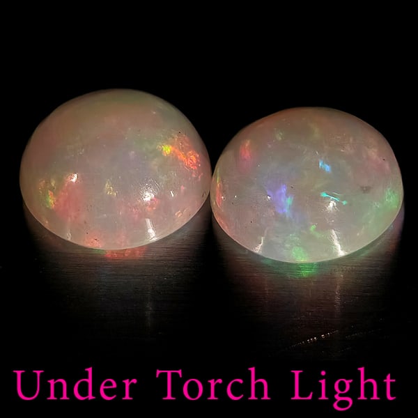 Natural Multi Color Opal 1.58 Ct. 2 Pcs Round Cabochon Shape 7 Mm Gemstones From Ethiopia: Product ID: 818728277 Product Name: Natural Opal Weight: 1.58 CT. Size: 7 x 7 x 3.3 MM. Shape: Round Color: Multi-Color Clarity:Semi - Transparent Luster: Good Gems Origin: Ethiopia Treatment: Unheate
