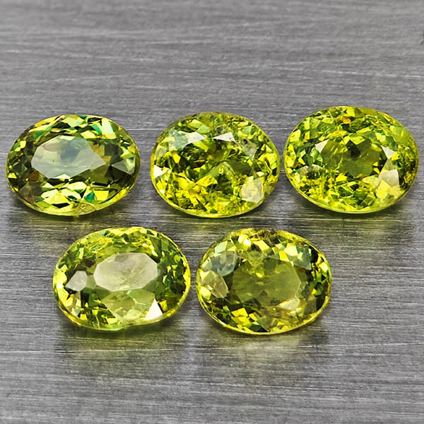 Natural Green Demantiod Garnet 1.06 Ct. 5 Pcs Oval Shape 4.1 x 3 Mm Gemstones From Madagascar: Product ID: 802937601 Product Name: Natural Demantoid Weight: 1.06 CT. Size: 4.1 x 3 x 2 MM. Shape: Oval Shape Color: Green Clarity:SI1 Luster: Good Gems Origin: Madagascar Treatment: Unheated Crystal