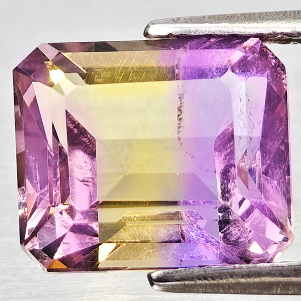 Natural Bi Color Ametrine 3.71 Ct. Octagon Shape 9.7 x 8.3 Mm Gemstone From Bolivia: Product ID: 800408321 Product Name: Natural Ametrine Weight: 3.71 CT. Size: 9.7 x 8.3 x 6.2 MM. Shape: Octagon Color: Bi Color Clarity:VSI - SI1 Luster: Good Gems Origin: Bolivia Treatment: Unheated C