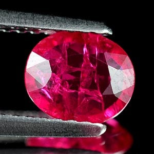 Natural Unheated Purplish Pink Ruby 0.81 Ct. Oval Shape 6.8 x 5.7 Mm. Gemstone From Tanzania (1 of 3)
