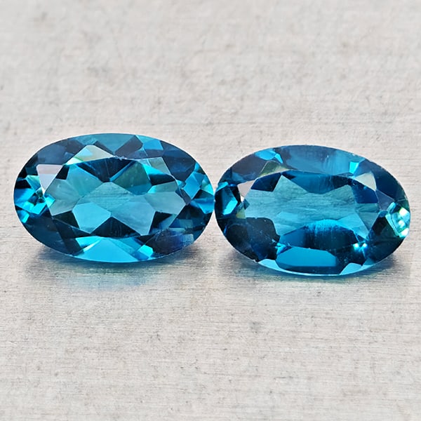 Natural London Blue Topaz 1.16 Ct. 2 Pcs Oval Shape 6 x 4 Mm Gemstones From Brazil: Product ID: 807168457 Product Name: Natural Blue Topaz Weight: 1.16 CT. Size: 6 x 4 x 3 MM. Shape: Oval Shape Color: London Blue Clarity:VSI - SI1 Luster: Good Gems Origin: Brazil Treatment: Treated C