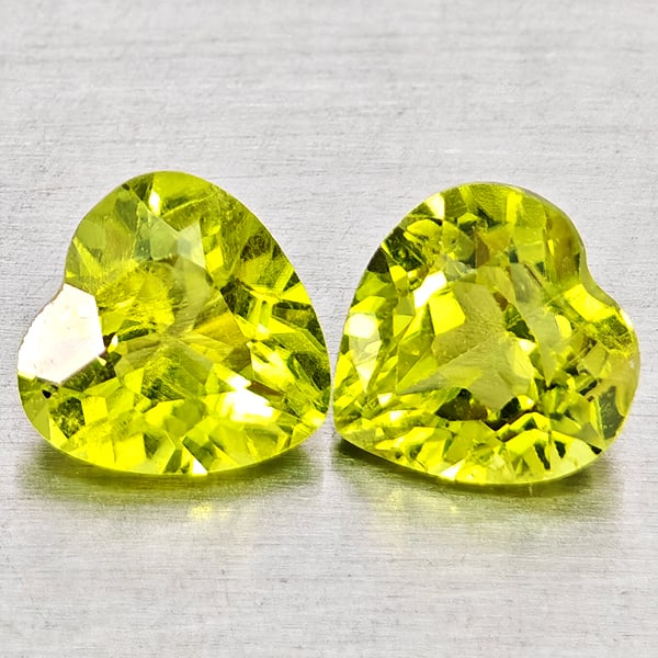Natural Green Peridot 1.75 Ct. 2 Pcs Heart Shape 6.1 x 6.1 Gemstones from Pakistan: Product ID: 805317294 Product Name: Natural Peridot Weight: 1.75 CT. Size: 6.1 x 6.1 x 3.5 MM. Shape: Heart Shape Color: Green Clarity:VSI - SI1 Luster: Good Gems Origin: Pakistan Treatment: Unheated