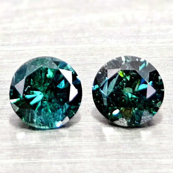 Natural Blue Diamond 0.18 Ct. 2 Pcs. Round Diamond Cut 2.8 x 2.8 x 1.7 Mm. From Belgium: Product ID: 502100392 Product Name: Natural Natural Diamond Weight: 0.18 CT. Size: 2.8 x 2.8 x 1.7 MM. Shape: Round Diamond Cut Color: Blue Clarity:SI1 Luster: Good Gems Origin: Belgium Treatment: Tre