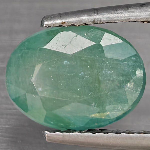 Natural Green Blueish Grandidierite 2.88 Ct . Oval Shape 10.3 x 7.7 Mm Gemstone from Madagascar: Product ID: 803100005 Product Name: Natural Tsavorite Weight: 2.88 CT. Size: 10.3 x 7.7 x 5 MM. Shape: Oval Shape Color: Green Blueish Clarity:SI1 Luster: Good Gems Origin: Madagascar Treatment: Unhea