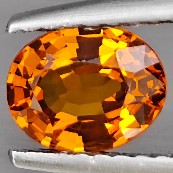 Natural Orange Spessartine Garnet 0.88 Ct. Oval Shape 6.9 x 5.5 Mm Gemstone From Namibia: Product ID: 802937844 Product Name: Natural Spessartine Weight: 0.88 CT. Size: 6.9 x 5.5 x 3.3 MM. Shape: Oval Shape Color: Orange Clarity:VSI Luster: Good Gems Origin: Namibia Treatment: Unheated Cry