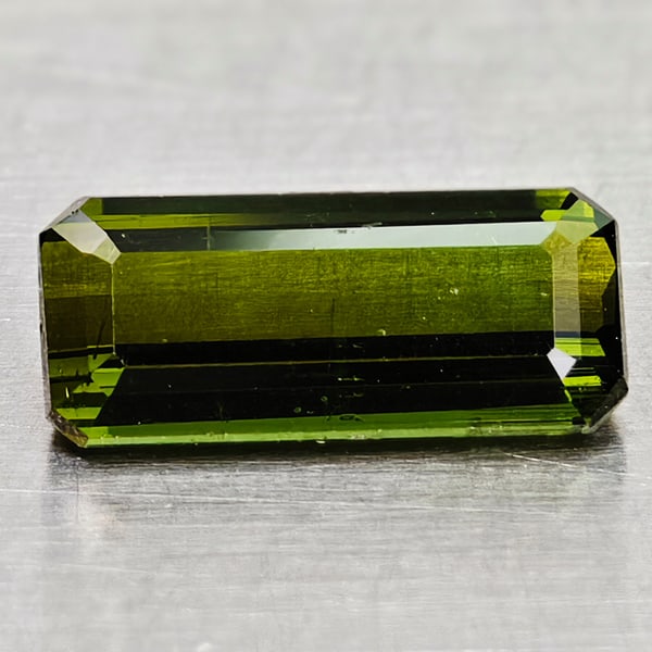 Natural Green Tourmaline 0.83 Ct. Ocatgon Shape 8.4 x 3.4 Mm Gemstone from Nigeria: Product ID: 807250842 Product Name: Natural Tourmaline Weight: 0.83 CT. Size: 8.4 x 3.4 x 2.7 MM. Shape: Octagon Color: Green Clarity:VVS Luster: Good Gems Origin: Nigeria Treatment: Unheated Crystal 