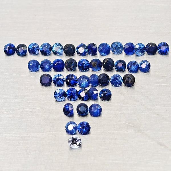 Natural Blue Sapphire 1.85 Ct. 43 Pcs Round Diamond Cut 2 Mm Gemstones From Madagascar: Product ID: 806162661 Product Name: Natural Blue Sapphire Weight: 1.85 CT. Size: 2 x 2 x 1.5 MM. Shape: Round Diamond Cut Color: Blue Clarity:VSI Luster: Very Good Gems Origin: Madagascar Treatment: H