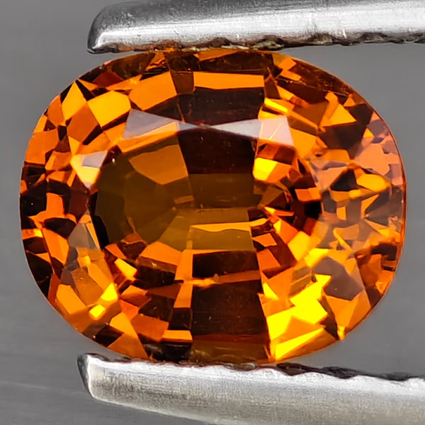 Natural Orange Spessartine Garnet 0.82 Ct. Oval Shape 6.7 x 5.5 Mm Gemstone From Namibia: Product ID: 802937832 Product Name: Natural Spessartine Weight: 0.82 CT. Size: 6.7 x 5.5 x 3.2 MM. Shape: Oval Shape Color: Orange Clarity:VSI Luster: Good Gems Origin: Namibia Treatment: Unheated Cry