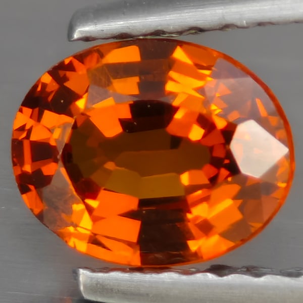 Natural Orange Spessartine Garnet 0.95 Ct. Oval Shape 7 x 5.9 Mm Gemstone From Namibia: Product ID: 802937833 Product Name: Natural Spessartine Weight: 0.95 CT. Size: 7 x 5.9 x 3.6 MM. Shape: Oval Shape Color: Orange Clarity:VSI Luster: Good Gems Origin: Namibia Treatment: Unheated Cryst