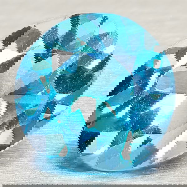 Natural Swiss Blue Topaz 0.99 Ct. Round Shape 6 Mm Gemstone From Brazil: Product ID: 807168118 Product Name: Natural Blue Topaz Weight: 0.99 CT. Size: 6 x 6 x 3.9 MM. Shape: Round Shape Color: Swiss Blue Clarity:VSI Luster: Good Gems Origin: Brazil Treatment: Treated Cryst